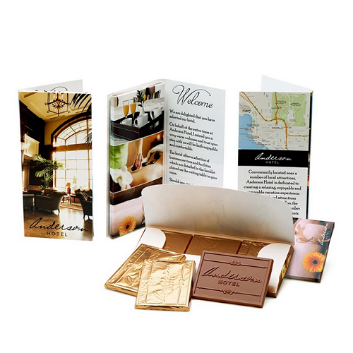 Mini brochure with three pieces of chocolate contained